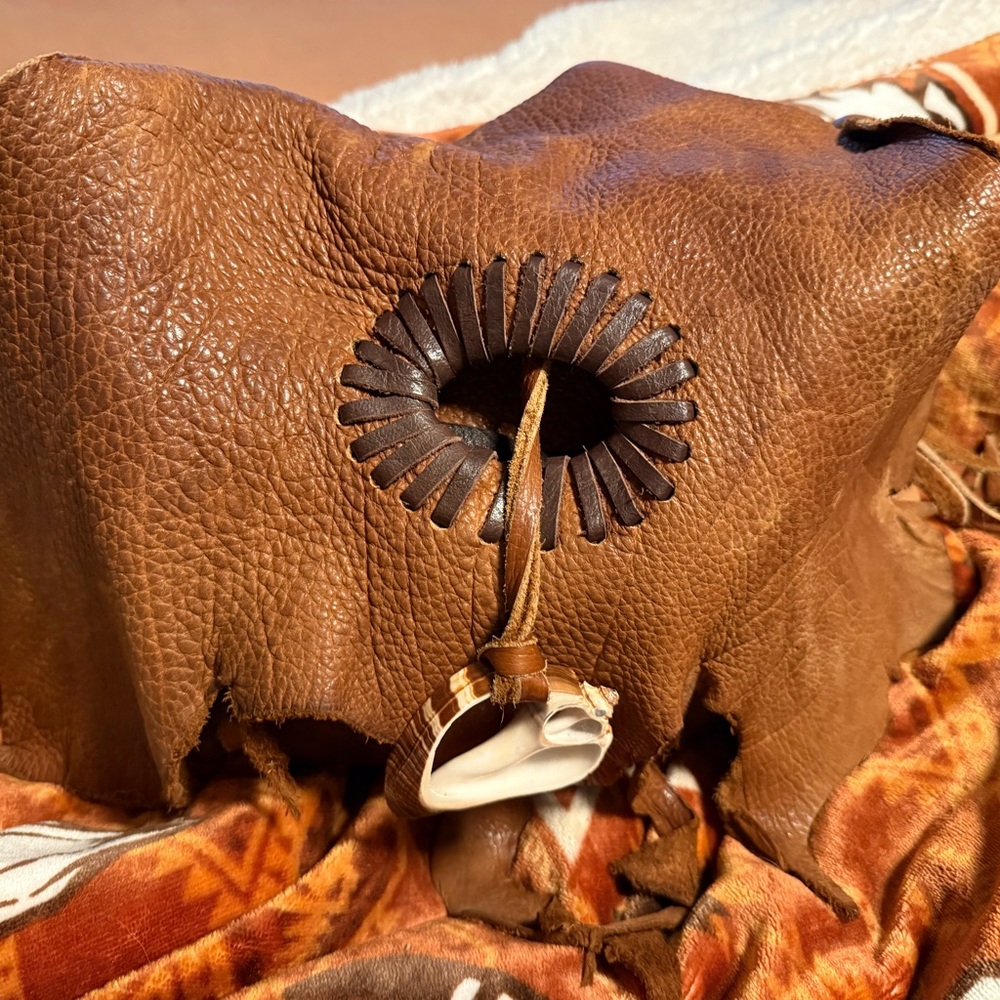 Soft Brown Leather Purse with Unique Decorative Accents
